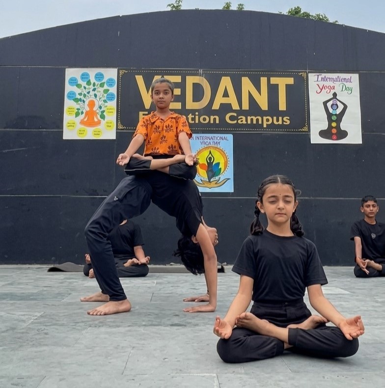 Students practising yoga at Vedant International School